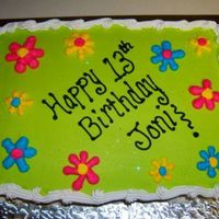 Dasies Piped daisies for a groovy cake!