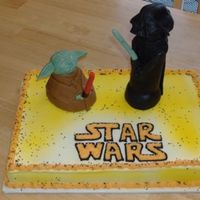 Star Wars Birthday Cake I hand made Yoda and Darth from MF. The kids loved them they even wanted to eat them!!!!