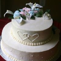 Wedding Cake For Friend Carrot cake with cream cheese frosting. Decorations are fondant/gumpaste