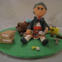 Retired Golfer This guy was a cake topper for a guy who was retireing. He is Irish, likes golf, tools and books. This was what I came up with... : )