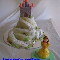 Enchanted Castle This is inspired on one of Debbie Brown's cake. I was pleased with the result.The Belle figurine is all fondant and took a while but...