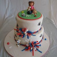 Girl With Doggies Cake This is the finished product. My daughter's 2nd b'day cake for her dog themed party. It took a while but she loved it and that...