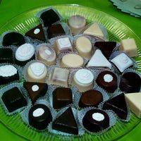 Petit Four Platter Different shapes and flavors of petit fours. Topped with fondant accents.