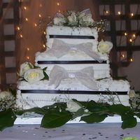 Rob And Pam's Cake This cake was all a rich pound cake with buttercream icing. They wanted it small and all gone after the wedding! It was to be quite...