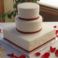 Very Simple Scrollwork I liked doing this cake even though it was so simple - I'm a fan of mixing the shapes. The flavors are French Vanilla Cake w/...