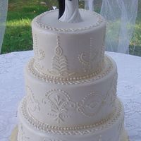 White Henna Design From Bride's Dress This is Pink Champagne Cake w/ Champagne Mousse Filling, Iced in Buttercream & covered in Fondant. This is based off the bride's...