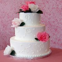 Brush Embroidery & Silk Flowers This is another Dummy Cake I did for my display window. It is iced in Buttercream Icing and the flowers are silk. A lot of my brides use...