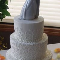 White On White Scrolls The bottom 2-layers of this cake are dummies. The bride ordered Centerpiece cakes to match her Wedding Cake for each table so the only real...