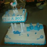 Baby Shower Cake This is a cake that I did with a friend of mine, I was teaching her the basic ropes of cake decorating, and I was doing the other pictured...