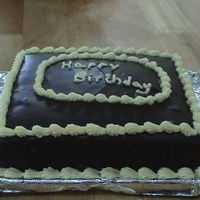 Dsc00578.jpg I was being lazy and didn't level or ice the cake before I poured ganache all over it ! But it tasted great ! This is my second cake...