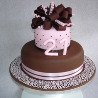 21St Birthday Cake For my daughter's 21st. Chocolate flavoured fondant on the bottom layer.