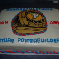 Promotion Cake This was done for a friend who just recieved a promotion. The cake is covered in MMF and the ring is a FBCT.