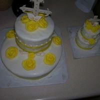Baptism I made this for my daughter's baptism. Both cakes were chocolate - I used regular buttercream for the smaller one; rolled buttercream...