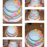 Birthday Cake Red velvet cake with cream cheese frosting, covered in fondant. Flowers are in royal icing. This was the first cake I sold!