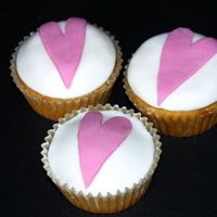 Heart Cupcakes Second attempt at cupcakes. Fondant icing on madiera cupcakes.