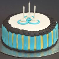 Striped Birthday Cake Carrot cake with lemon cream cheese frosting, covered with fondant.