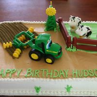 John Deere Tractor Farm Cake THIS IS ONE OF MY FAVORITES I DID FOR A FRIEND. SHE BROUGHT ME THE TOYS, AND I JUST HAD A BLAST DECORATING AROUND THEM.
