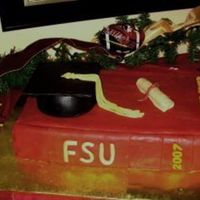 Graduation Cake First "book" cake for a friends graduation from college. Lessons learned: garnet is hard to duplicate, MMF is easier to work with...
