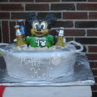 40Th Birthday Mickey Mouse In An Eagles Jersey Mickey mouse made out of rice krispy treats covered in fondantSugar beer bottles with edible labels (not neck-those were from real bottles)...