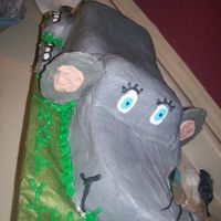 Elephant Cake Vanilla cakes carved out to make an elephant. The ears are melted white chocolate. All buttercreme