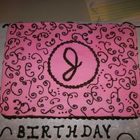 Scrollwork Sheet cake - pink Scrollwork in brown - the girls name started with a "J: tha, therefore that is where the "J" on the cake...