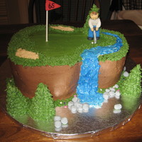 Golf I used several cakes from CC to make this one, it was perfect for my Dad.Buttercream with fondant accents.