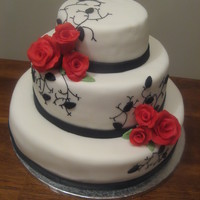 Round Black And Red I saw this cake on this site, can't remember whose it was but it was so pretty I had to make it.