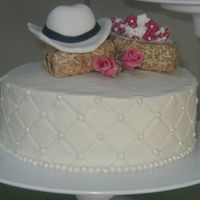 A Closer Look This cake was for some relatives and I thought it would be cute to do a hat and veil because I know they like western stuff. My great-aunt...