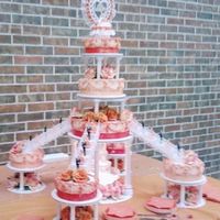 Orange Quinceanera All whipped icing with two shades of orange satin ribbon.