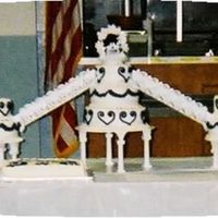 My First Wedding Cake I am very sorry about the pic-It is the only one I have! The wedding cake is all yellow with all buttercream icing with royal (not navy)...