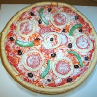 Pizza Cake Made for a a manager of a pizza place that is being transfered to another store. It was a lot of fun to make. The cheese is tinted coconut...