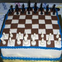 Chess Game This is another cake for my cousins graduation party. He is big into chess and wanted a chess game for one of his cakes. I used chocolate...