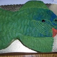 Fish this cake idea was my husbands. He kept telling me that I needed to do a fish and make it look real. I was not so sure. But in the end it...