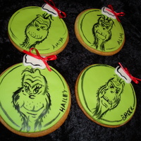Grinch Cookies NFSC w/ fondant and hand painted Grinches. For my daughter's Whobilation party.