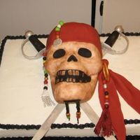 Pirates Of The Caribbean 2-12x18 cakes one chocolate the other vanilla. Iced in BC ALL details are done in fondant except for the maroon tassel.