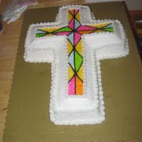Communion vanilla cross Iced in BC and tinted piping gel
