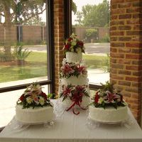 Wedding Cake With Fresh Flowers My first wedding cake attempt, as well as my first upload on this site. Please leave feedback. The cakes were two layer with bc icing and...