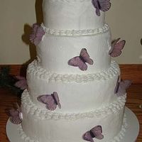 Butterfly Weddin Cake This was my first wedding cake. I used the article from here on how to make edible butterflies but I used Vellum paper instead.