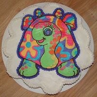 Peek-A-Boo cupcake cake with Peek-a-boo BTC transfer for dd#1's 10th birthday. (3-06) Peek-a-boo is a Lisa Frank character.