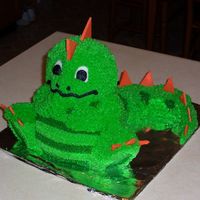 Dragon Cake I love this cake. Made for a co-worker's friend. The upright scales are made out of chocolate. It wasn't as hard as I originally...