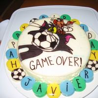 Tom And Jerry cheese cake with a thin layer of jello on top with a painted picture ... I don't particularly know how to do this yet ... my friend...