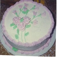 Wilton Rose Cake This was my first Wilton Cake I made at the end of Course I. White cake with vanilla filling.