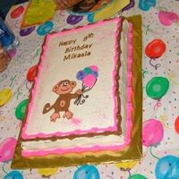 Monkey Birthday Cake Choc cake w/ banana & custard filling. Frosted w/ whipped cream. FBCT monkey and royal icing letters.