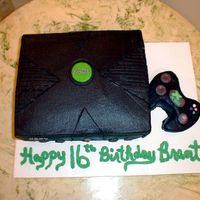 Xbox Cake For a boy turning 16. Warned them about the black icing and stains. It is only about 1/2 of an inch off the correct dimensions for the real...