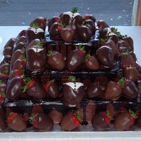 Square Groom's Cake 3 tier square choclate cake. Could hardly see the cake with all the strawberries.