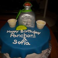 Patron Shots Cake I made this cake for an Adult Birthday. The Patron Bottle is made with rice crispy treats covered in fondant. The two shot glasses are...