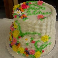 Best Wishes Cake I made this with the leftover flowers that I had from Course 2 for a Retirement party at my husbands office. Its a little off-centered,...