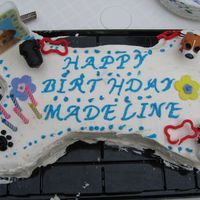 Dog Bone Cake This is a cake my daughter designed. I carved the dog bone out of a 1/2 sheet cake. It is vanilla cake with butter cream dream icing. I...