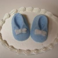 Sugar Booties Buttercream with molded sugar baby booties.