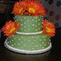 Gerber Daisy Cake This a cake that I made for my 30th birthday. The top cake is a strawberry/pecan cake and the bottom cake is a banana/pineapple cake. The...